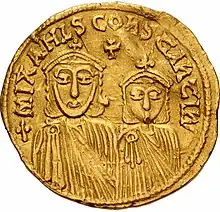 Gold coin depicting Constantine, who is shown smaller on the right, and next to his grandfather Michael II, large on the left. Both figures are adorned with imperial regalia.