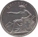 Helvetia seated, holding shield bearing the Swiss Cross, pointing left. Legend above.