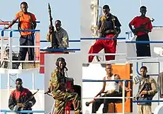 Image 18A collage of Somali pirates armed with AKM assault rifles, RPG-7 rocket-propelled grenade launchers and semi-automatic pistols in 2008 (from Piracy)