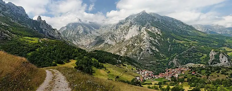 Image 16Picos de EuropaPhoto: Mick StephensonThe peaks of the Central Massif overlook the village of Sotres in Cabrales, located in the Picos de Europa, a mountain range in northern Spain forming part of the Cantabrian Mountains. The name (literally: "Peaks of Europe") is believed to derive from being the first European landforms visible to mariners arriving from the Americas.More selected pictures