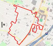 A street map of south central Albany showing the district boundary as a red line