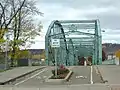 A view of the bridge from the south, from the intersection of Washington Street and Conklin Avenue.