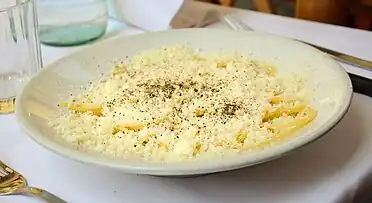 Spaghetti cacio e pepe (cheese and pepper) at a restaurant in Rome