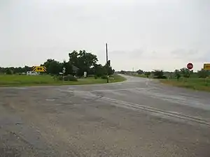 FM 1161 curves sharply to the northeast at FM 640 in Spanish Camp.