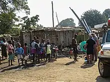 Street with people and shanty town