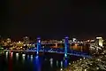 Illuminated at night: View from Hyatt Regency Hotel, with the Acosta Bridge visible in the background