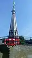 From a different angle, the spire from Sir Christopher Wren's St Antholin's Church which once stood in the City of London, now located in Round Hill, Forest Hill. The land that the spire is now on is now owned by the London and Quadrant housing association