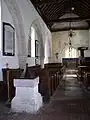 The nave showing the filled-in north arcade.