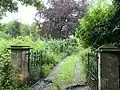 The gateposts and driveway up to the manse