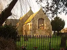 Outside view looking at the east gable of the chancel