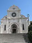 The front side of the cathedral, with the rosetta and the portal