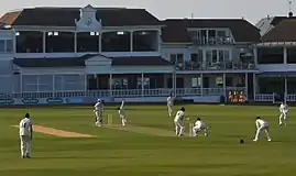 A colour photo of a cricket match in progress at the St Lawrence cricket ground in Canterbury