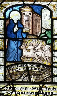 A stained glass window depicting St Neot (detail)