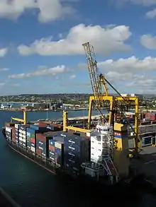 Image 15A container ship docked in the deep water harbour of Bridgetown, Barbados, which opened in 1961. (from History of the Caribbean)