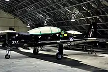 A RAF Shorts Tucano T1 in storage at RAF Shawbury.