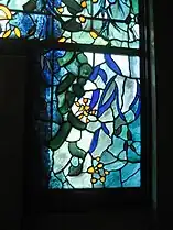 A section of the chapel stained-glass windows by John Piper