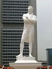 Replica of a statue of Sir Stamford Raffles by Woolner, erected at the spot where he first landed at Singapore. The original statue stands at the Victoria Memorial Hall. Raffles is the founder of modern Singapore.