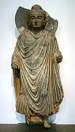 Standing Buddha sculpture, ancient region of Gandhara, northern Pakistan, 1st century CE, Musée Guimet