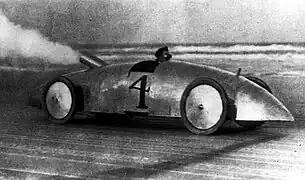 Image 43A Stanley Steamer racecar in 1903. In 1906, a similar Stanley Rocket set the world land speed record at 205.5 km/h (127.7 mph) at Daytona Beach Road Course. (from History of the automobile)