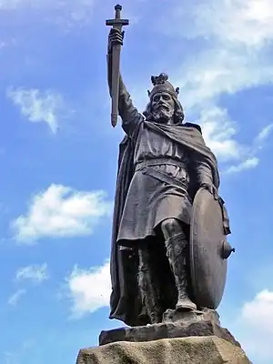 Image 9King Alfred the Great statue in Winchester, Hampshire. The 9th-century English king encouraged education in his kingdom, and proposed that primary education be taught in English, with those wishing to advance to holy orders to continue their studies in Latin. (from Culture of the United Kingdom)