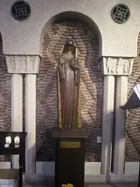 Wooden Statue of Saint Odile (nave side chapel)