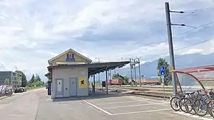 Two-story building next to railway lines