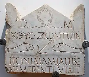 Image 44This funerary stele from the 3rd century is among the earliest Christian inscriptions, written in both Greek and Latin: the abbreviation D.M. at the top refers to the Di Manes, the traditional Roman spirits of the dead, but accompanies Christian fish symbolism. (from Roman Empire)