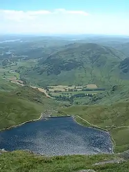 An upland lake surrounded by mountains