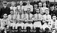 A black and white team photo of Stockport County