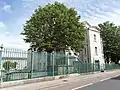 Block built as part of the new west front (1867–71) to house 24 subalterns. In the background part of the east barrack block (1783).