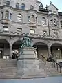 A statue of Queen Victoria sits outside the Strathcona Music Building.