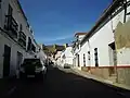 Street leading up to the castle in the village of Santa Olalla del Cala
