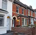 Earlier 70° cast stone lintel on a larger house in Strood