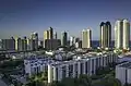 Skyline from the West in 2015. On the left side of the photo some of the oldest high rises in the city, dating to the 1960s and 1970s, can be seen.