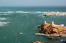 Watchtowers on hills overlooking the Arabian Sea