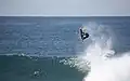 Airborne surfer off Ballito Beach