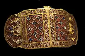 Shoulder-clasps from Sutton Hoo; early 7th century; gold, glass & garnet; length: 12.7 cm; British Museum (London)