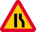 Road narrows on right sides