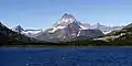 Mount Wilbur rises above Swiftcurrent Lake