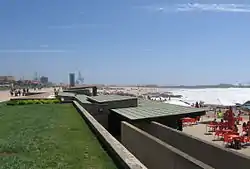 Street level, changing facilities, and beach area of the swimming pool