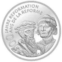 Calvin (left) and Huldrych Zwingli on a Swiss 20 franc coin commemorating the 500th anniversary of the Reformation.