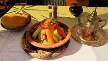 Moroccan tajine with bread and mint tea