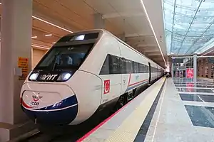 A TCDD HT65000 EMU awaiting departure from the tracks underneath the ATG terminal