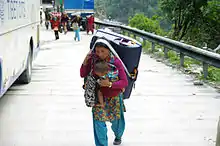 Women hard at work at the Sino-Nepal Friendship Bridge border crossing.