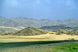 A view of Taif with a road at the foreground and mountains at the background. Muhammad went there to preach Islam.