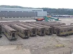 Withdrawn 5000 series cars at the Nihon Sougou Recycle plant in Takaoka, Toyama, awaiting scrapping in May 2013