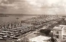 Several ships stern on to dockside