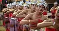 Tebe dancers wearing traditional clothes