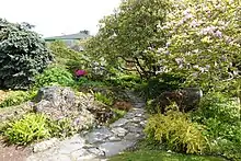 The tea house pokes out above the main garden area.