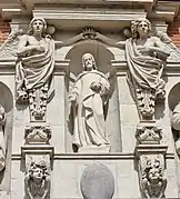 Winged terms on the gate of Saint-Pierre des Chartreux.